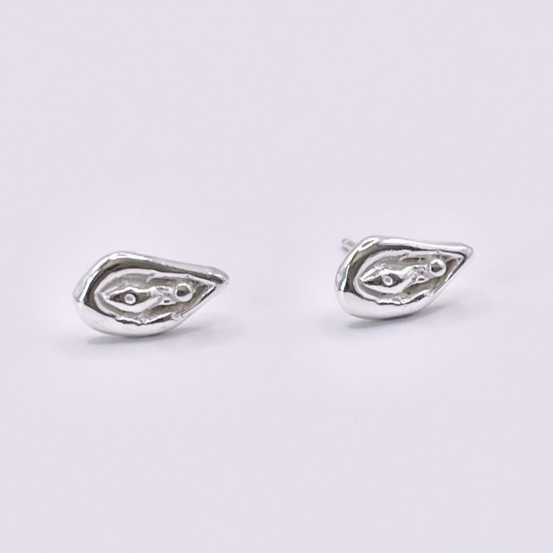 Viva la Vulva! A silver or gold stud earring with a vulva design that also looks like an oyster 