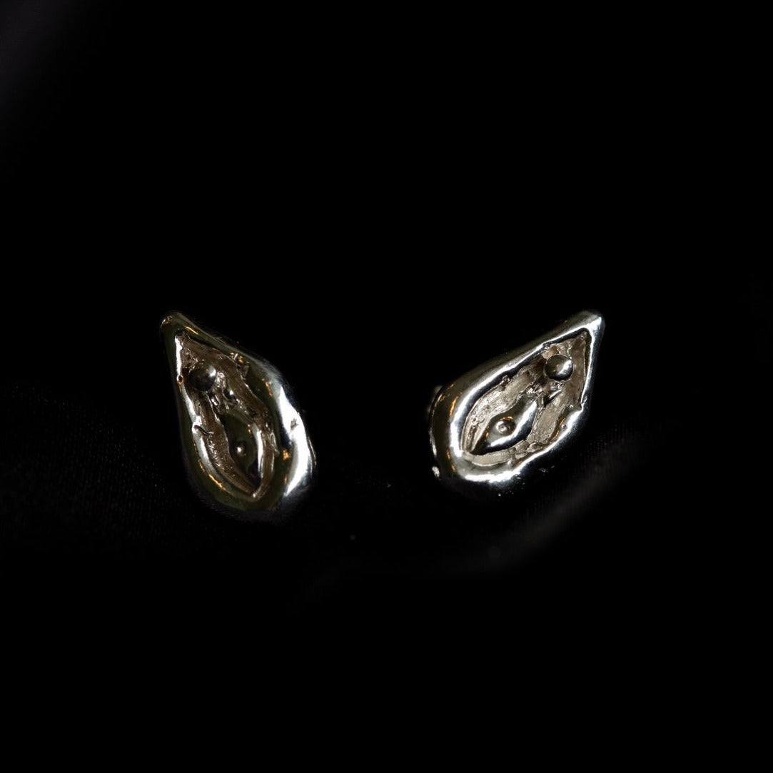 Viva la Vulva! A silver or gold stud earring with a vulva design that also looks like an oyster 